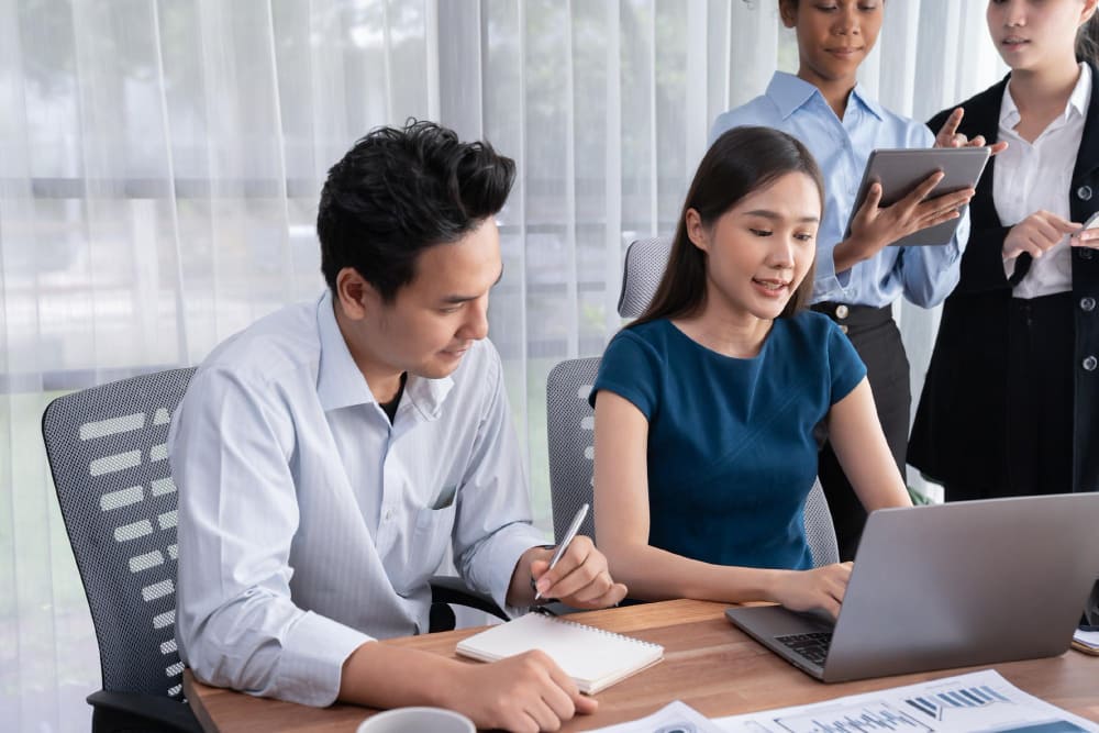 RPO service consultants from Manpower Vietnam is brainstorming strategies for a client.