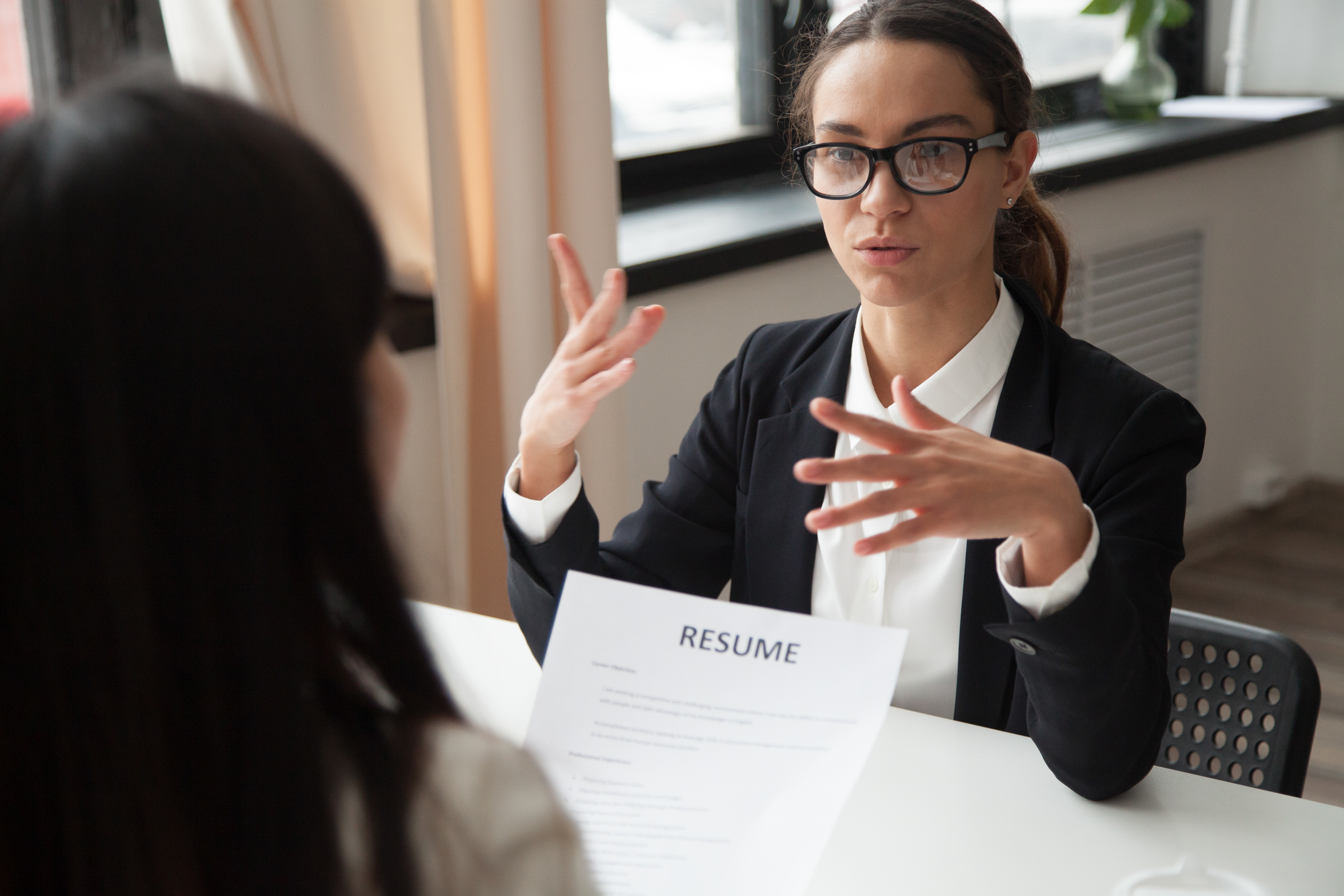 Recruiter exploring the candidate’s reasons for leaving a job to assess mindset and career values.