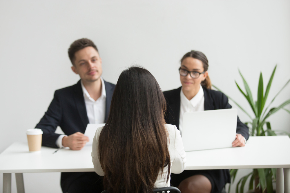 Customer service candidate being interviewed by the agency hiring staff